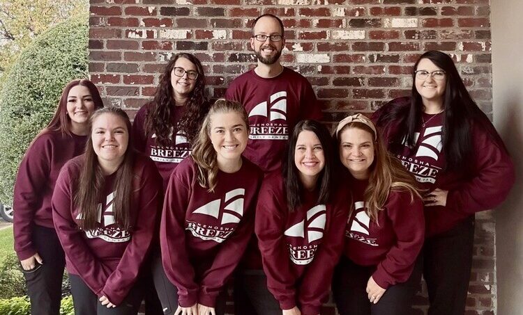 A team photo of a dental team in Broken Arrow, OK